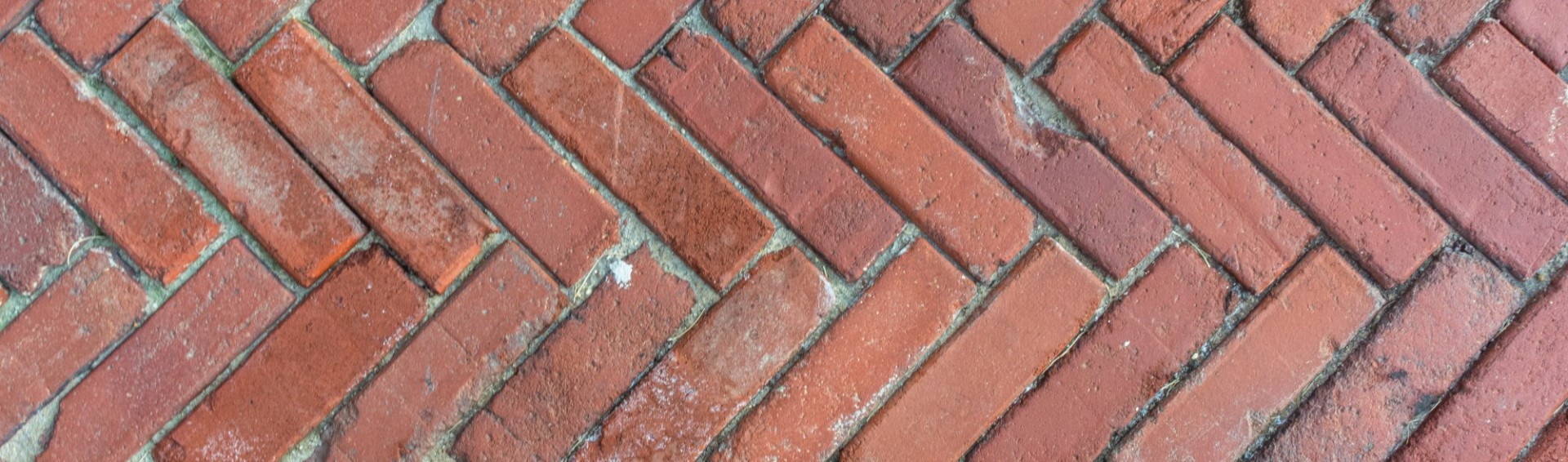 A close-up photo of the brick walkway on Columbia University's College Walk.