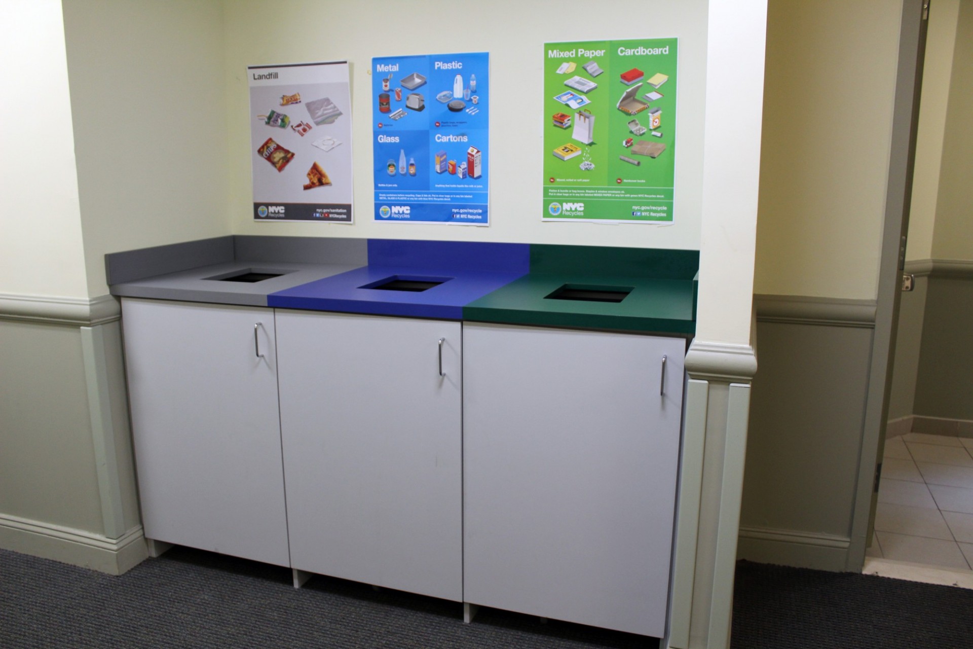 Recycling station in the residence halls with three bins