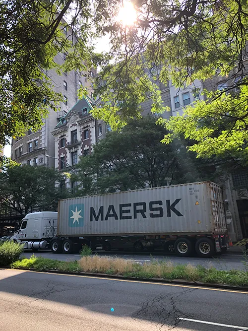 The full cargo truck parked on Riverside Drive