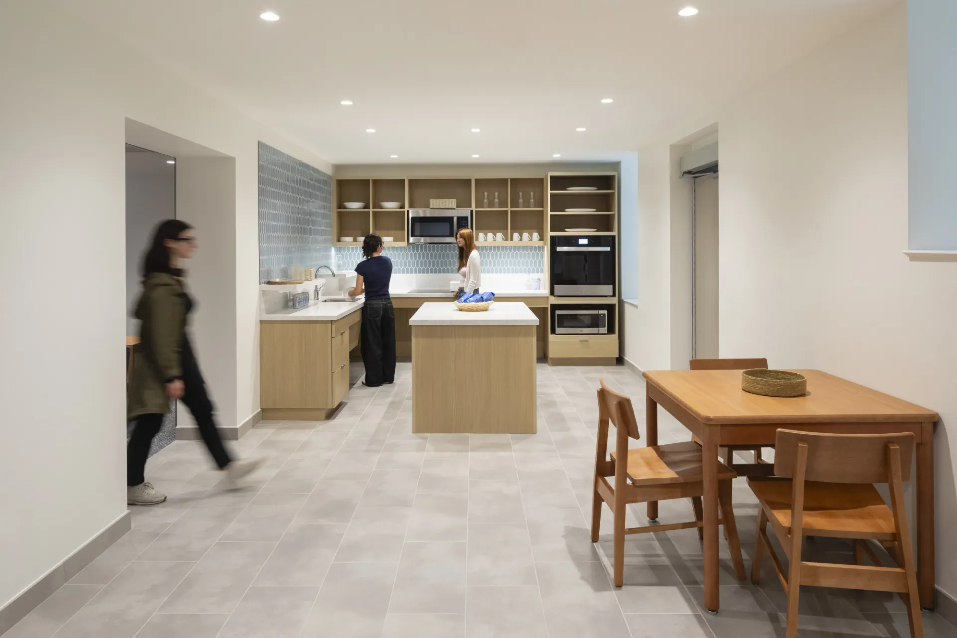 Building lounge with kitchen and tables