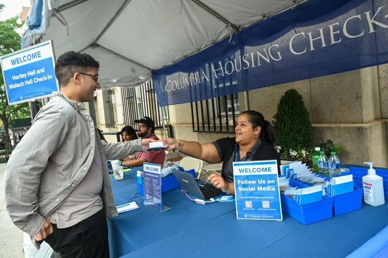 A student at a Check-In Station