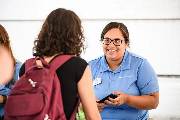 Student being welcomed at New Student Orientation